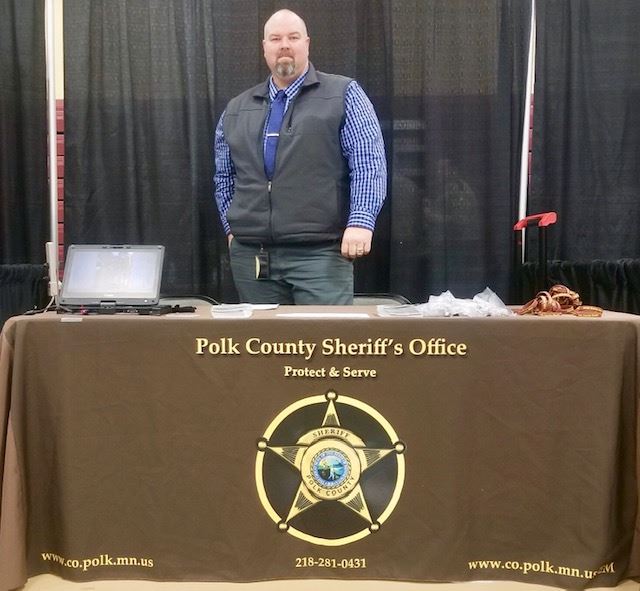 An officer at a job fair.