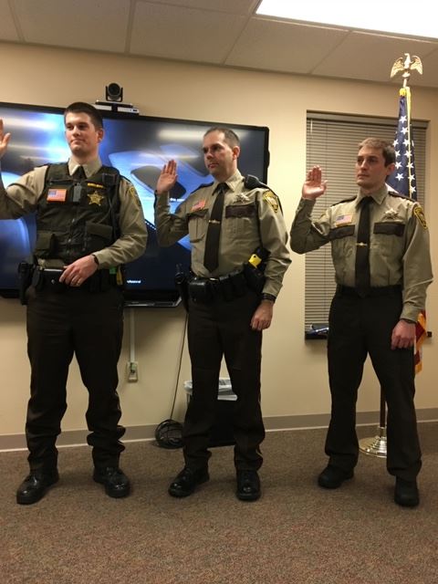 Three officers swearing in