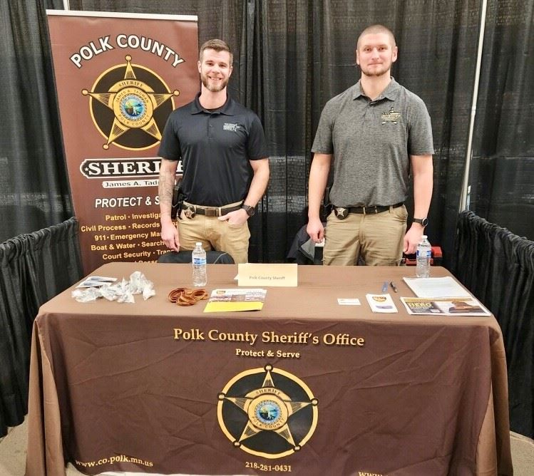 Two Polk County deputies at a job fair.