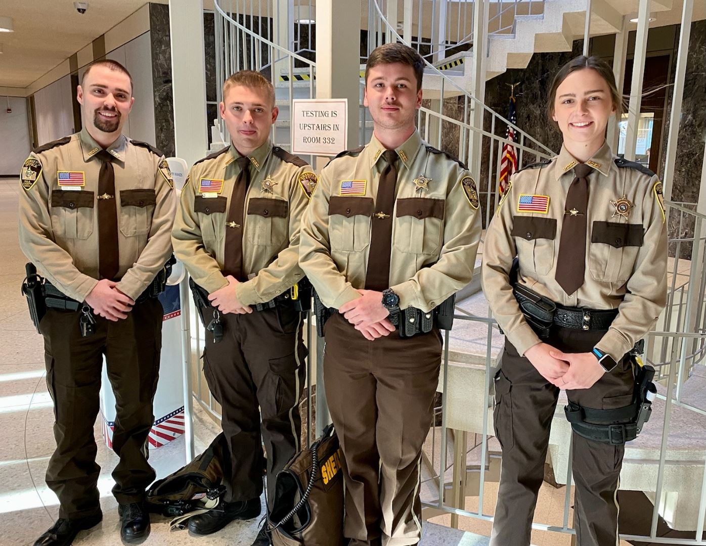Four new Polk County deputies in the Government Center.