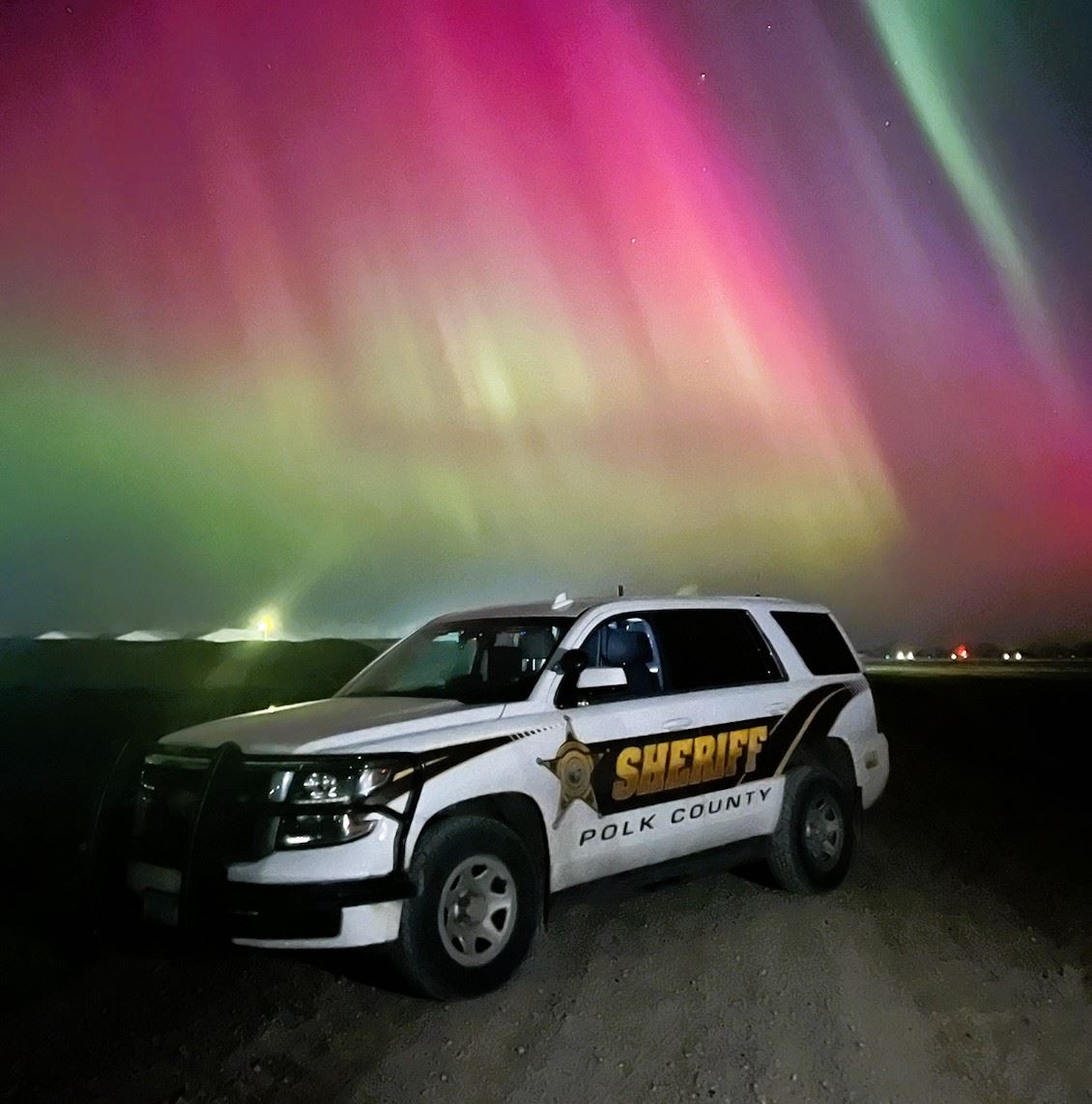 The Northern Lights over a Polk County cruiser.