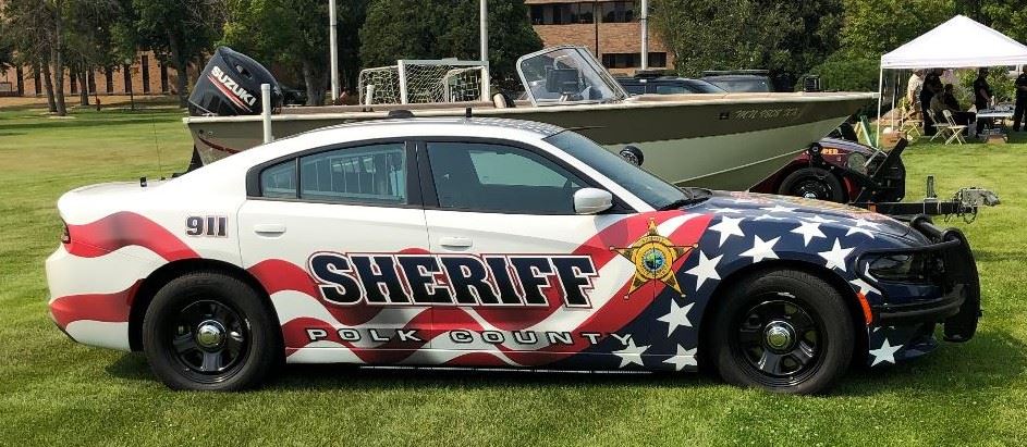 Polk County cruise wrapped in an American flag decal.