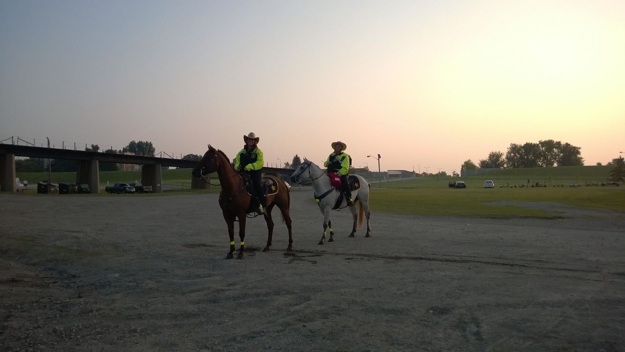 Past Members Brittany Mosher and Cathy Desrosier On Horses